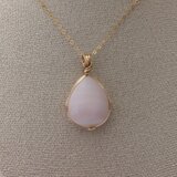 発光　ピンクカルサイト　ペルー産 女神巻き® ペンダントトップ