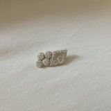 まるとひしがたのブローチの画像