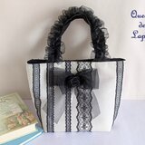 ブラックレース模様のミニトートバッグの画像