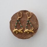 緑の瞳をもつ魚のピアス（イヤリング）の画像