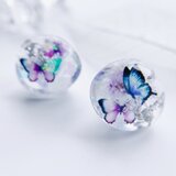モルフォ蝶とかすみ草のピアス　サージカルステンレス　金属アレルギー対応の画像