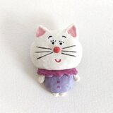ブローチ　赤鼻のねこの画像