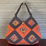 二色の紬剥ぎ　多色の花柄嵌め込みの手提げ