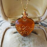 ヴィンテージ　琥珀ブラウン・風と花のHeart　ネックレス