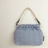 スマホも入るばねポーチ　持ち手つき 黒タグ