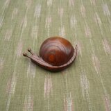カタツムリのブローチの画像