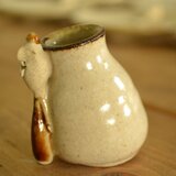 こさじぃ運ぶ楊枝立て