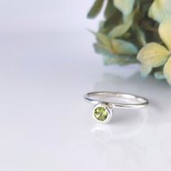 ペリドット 婚約指輪 ブルートパーズ 結婚指輪 8月 12月 誕生石