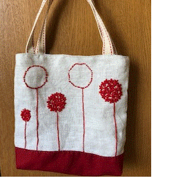 刺繍の赤いお花のバッグの画像