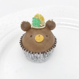 気まぐれなクマのカップケーキマグネットの画像