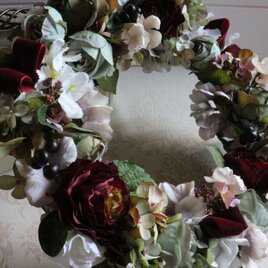 ブルーローズとラナンキュラスのリース　(約３５㎝)
