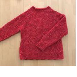 真っ赤なセーターの画像