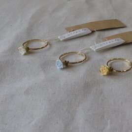 ちょこんと小花の指輪_ライトブルー(12号）