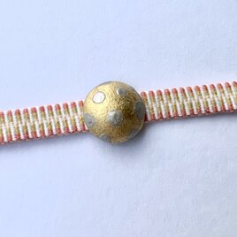 まる型　陶器の帯留め プラチナDOTの画像