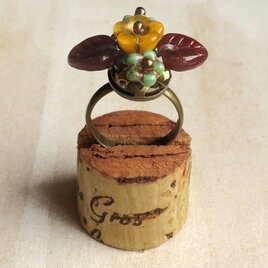 お花の指輪（蜜柑色）の画像