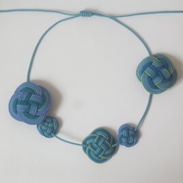 結びのネックレス(青緑)の画像
