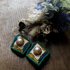刺繍とビーズの耳飾り…aynu sik…の画像