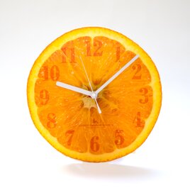 【掛け時計/置き時計】オレンジ（アクリル製）の画像