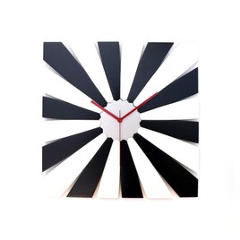TimeBlend 黒と白 - 交互に色分けされた放射状のパターンを持つ長方形の時計の画像