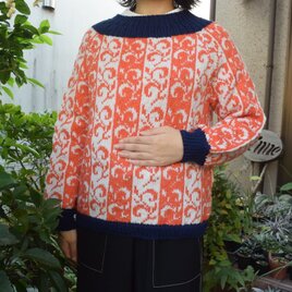 縦蔦柄のアプリコットセーターの画像