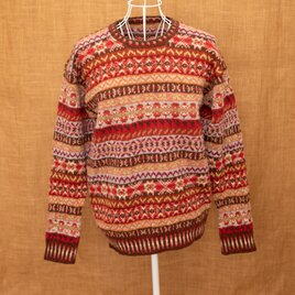 フェアアイルの赤いセーターの画像