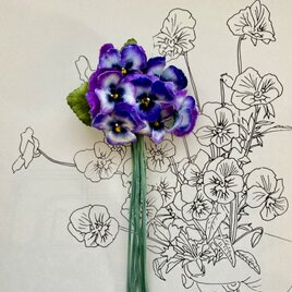 Cute purple pansy corsageの画像