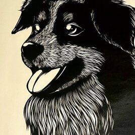 額装済み切り絵作品・笑顔の犬