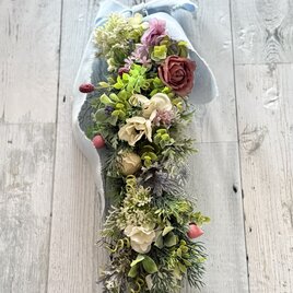 ナチュラルグリーンの癒したっぷりのバトンリースの画像