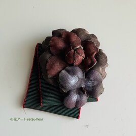 A  249  リボンにプチカメリアの画像
