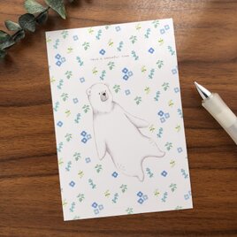 小花に揺れるシロクマさん　ポストカードの画像