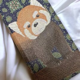 【まなざし】レッサーパンダの帯なし手帳型iPhoneケースの画像