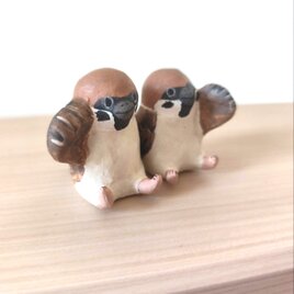 風を掴む招き雀さん