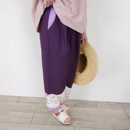 グレープリネン・蝶の刺繍とフラワーの裾切替タックパンツの画像