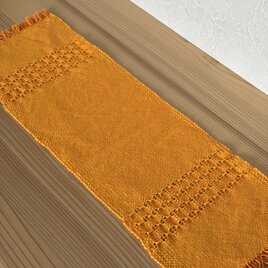 山吹色の手織り敷物