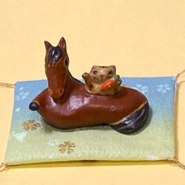 馬乗り招き猫（共招き）