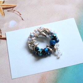 夢見るイルカの遊ぶ海　光る海ほたる