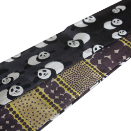 正絹リバーシブル帯｜愛らしい「パンダ」× 都会の「石畳」