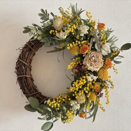 黄色いお花の三日月リース