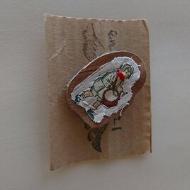 革と女の子の異素材ブローチ