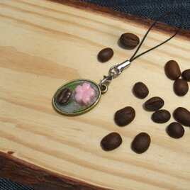 桜と珈琲豆のストラップの画像