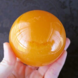 オレンジカルサイト スフィアC 70mm Orange calcite sphereの画像