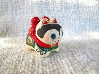 小さな小さな犬張り子(木彫り)の画像