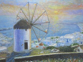 ポニ－の風車と夕日の画像