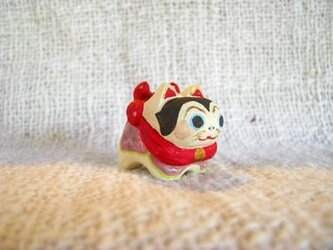 小さな小さな犬張り子(木彫り)の画像