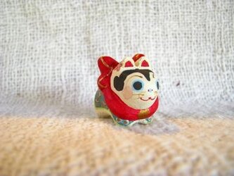 小さな小さな犬張り子(木彫り)の画像