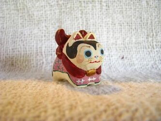 小さな小さな犬張り子(木彫り)の画像
