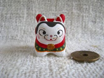 小さな小さな犬張り子(木彫り)の画像