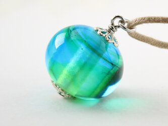 ガラスアクセサリー【青緑 】縞の小石 M57の画像
