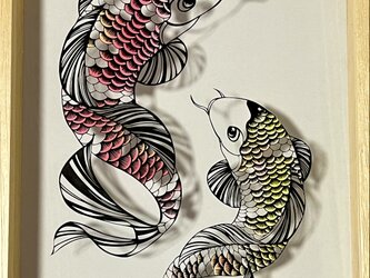 額装済み切り絵作品・登るの画像