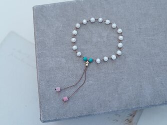 cord bracelet pearl ベージュの画像